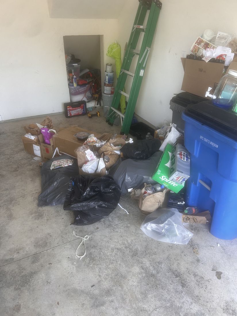 Before the garage cleanout, junk piled up